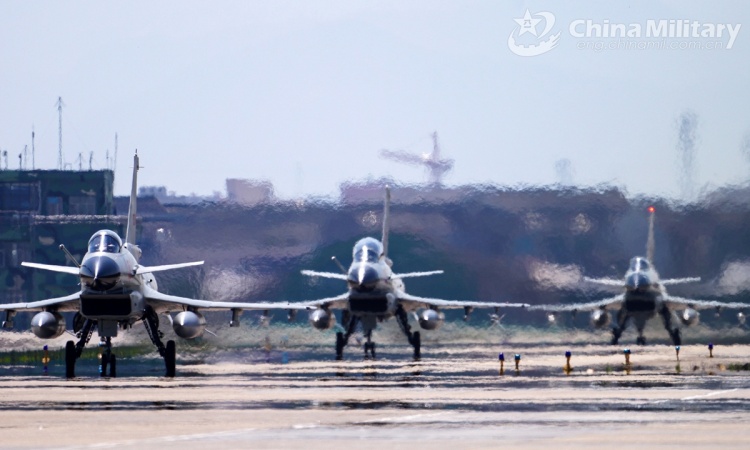 China to hold month-long military drills in South China Sea
