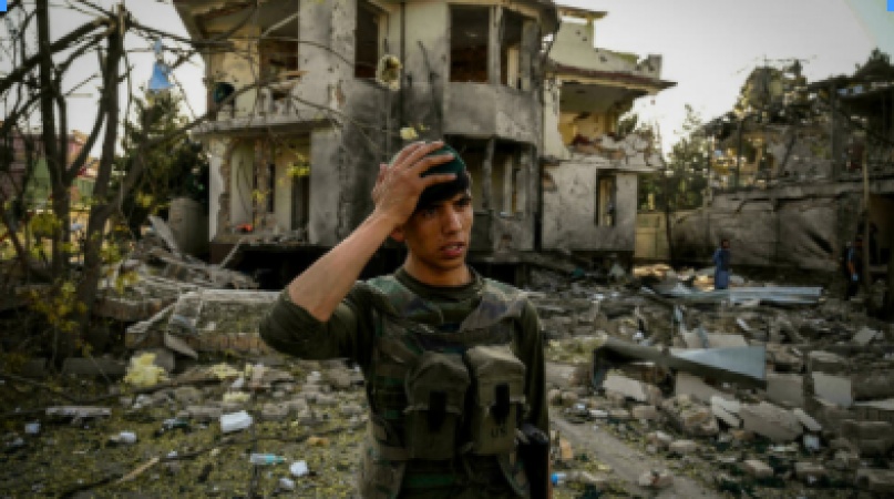 Afghan forces defend besieged cities as Taliban threaten more targeted attacks