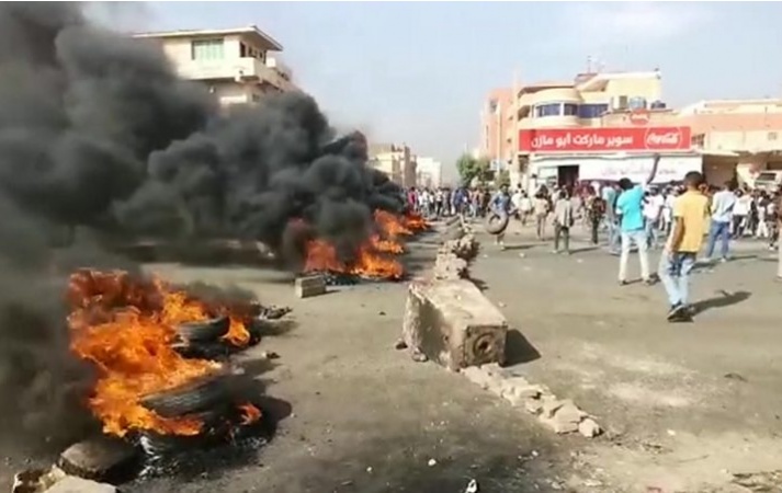 Sudan army seized power to prevent civil war - coup leader