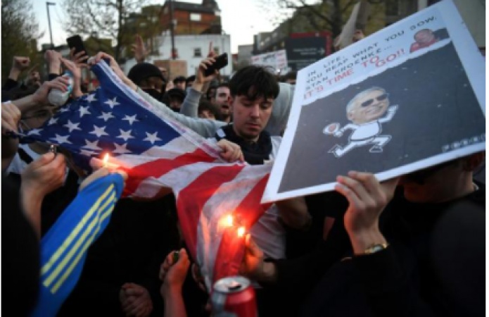 Arsenal fans turn to devil and vampire in protests at owner Kroenke